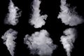 Set of abstract white smoke against dark background Royalty Free Stock Photo