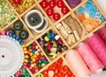 Set of accessories and jewelry to embroidery, haberdashery, sewing accessories top view, seamstress workplace, many object for nee