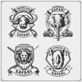 Set of african animals emblems. Lion, elephant, rhino and buffalo. Royalty Free Stock Photo