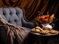 Velvet Reprieve: Chaise Lounge with Silk Cushions and Autumnal Tea Setting on a Gradient Gray Canvas Royalty Free Stock Photo