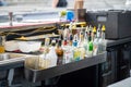 A set of alcohol bottles behind the bar, different liquor bottles closeup, bartender course job abstract concept, nobody