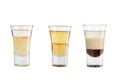 Set of alcohol shots on a white background. Three shots interesting with strong alcohol