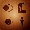 Set Alien, Eclipse of the sun, Satellites orbiting the planet Earth and Astronaut helmet on wooden background Royalty Free Stock Photo