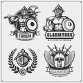 Set of ancient warrior emblems, labels and design elements. Gladiator and spartan weapon and armour.