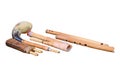 A set of ancient woodwind musical instruments, isolated on a white ba Royalty Free Stock Photo