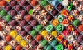 a set of appetising little cakes seen from above, seamless, tileable