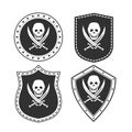 Set of army badges with a pirate symbol.