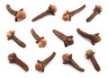 Set with aromatic dried cloves on white background Royalty Free Stock Photo