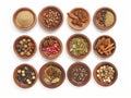 set of aromatic spices on wooden plates on white background Royalty Free Stock Photo