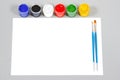 Set of art gouache paints and brushes and paper Royalty Free Stock Photo