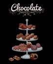 Set of assorted delicious handmade dark and milk chocolate candies over brown background. Side view, close up