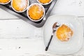 Set of assorted fresh baked vanilla muffins  on white rustic wooden table , top view Royalty Free Stock Photo