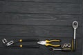 Set of assorted work carpentry and locksmith tools on a dark wooden background with copy space Royalty Free Stock Photo