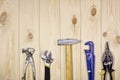 A set of assorted work carpentry and locksmith tools on a light wooden background with copy space Royalty Free Stock Photo