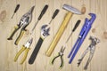 A set of assorted work carpentry and locksmith tools on a light wooden background with copy space Royalty Free Stock Photo