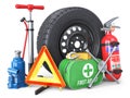 A set of automotive accessories. Spare wheel, fire extinguisher, first aid kit, emergency warning triangle, jack, tow rope, wheel Royalty Free Stock Photo