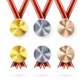 Set of Awards. Golden Silver and Bronze medals with laurel hanging on red ribbon. Award symbol of victory and success. Vector