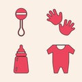 Set Baby clothes, Rattle baby toy, Baby hands print and Baby bottle icon. Vector Royalty Free Stock Photo