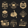 Set of Bakery shop badge. Vector Design with windmill, rolling pin, dough, wheat ears, old oven, wooden bread shovels Royalty Free Stock Photo