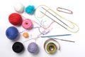 Set of balls of multi-colored threads for knitting and items for knitting.