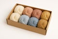 A set of balls of thick yarn of different colors in a box. Royalty Free Stock Photo