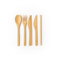 A set of bamboo utensils arranged on a white background includes a spoon, fork, Royalty Free Stock Photo