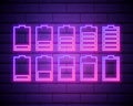 Set of battery neon icon. Charger glowing sign. Vector symbol of low and full battery isolated on brick wall Royalty Free Stock Photo