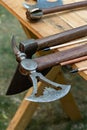 Set battle ax old viking weapon lies on the edge of the gunsmith table Royalty Free Stock Photo