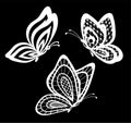 Set of beautiful black and white guipure lace butterflies .