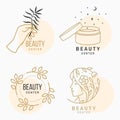 Set of Beauty center emblem with cosmetic cream, woman face, flower with leafs. Beauty center. Vector illustration. Royalty Free Stock Photo