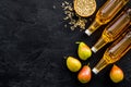 Set of beer bottles with apple, pears, wheat from above Royalty Free Stock Photo