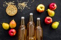 Set of beer bottles with apple, pears, wheat top-down Royalty Free Stock Photo