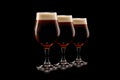 Set of Beer glasses on a black background. Mugs with drink like Ipa, Pale Ale, Pilsner, Porter or Stout Royalty Free Stock Photo