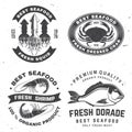 Set of best seafood badges. Fresh dorade, octopus, shrimp, shrimp, dressed crab, squid delicious. Vector. For seafood