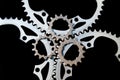 A set of bicycle chainrings closeup on black