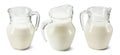 Set of big glass milk jars isolated on white background