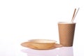 Set of biodegradable disposable tableware on white background.