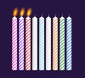 Set of birthday multicolored candles. New, burning Royalty Free Stock Photo