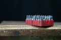 A set of bits for repair. Black background. Plastic case with a red background Royalty Free Stock Photo