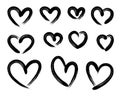 Set of black brush stroke grunge hearts icons isolated on white Royalty Free Stock Photo