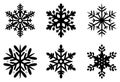 Set of black Frosty snowflakes on an isolated white background.