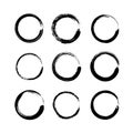 Set of black grunge round shapes isolated on white background. Circle hand drawn frames, logo ink brush strokes Royalty Free Stock Photo