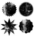 Set of black grunge starburst stamps on white background. Badges and labels various shapes Royalty Free Stock Photo