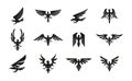 Set of black heraldic eagle symbols on white background.
