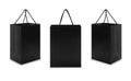 Set of Black paper bag with handles isolated on white background with clipping path. Royalty Free Stock Photo