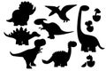 Set of black silhouettes of dinosaurs on a white background, stegosaurus, Triceratops, Tyrannosaurus, Brontosaurus