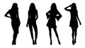 Set of black silhouettes of fashion model girls in mini different type of clothes standing and posing. Royalty Free Stock Photo