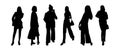 A set of black silhouettes of girls of models in business clothes for printing on T-shirts, mugs, bags, decoration and Royalty Free Stock Photo