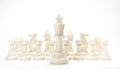 Set of black & white chess figures on white background. White king chess with others white isolate with text space for business