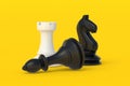 Set of black and white chess figures on yellow background Royalty Free Stock Photo